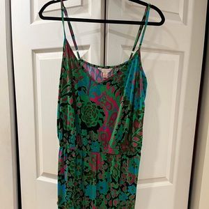 Light weight bright floral minidress with adjustable straps and elastic waist